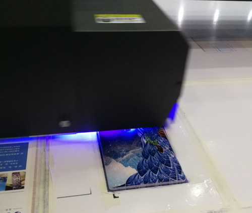 UV平板打印机介质自动测高系统有什么作用？